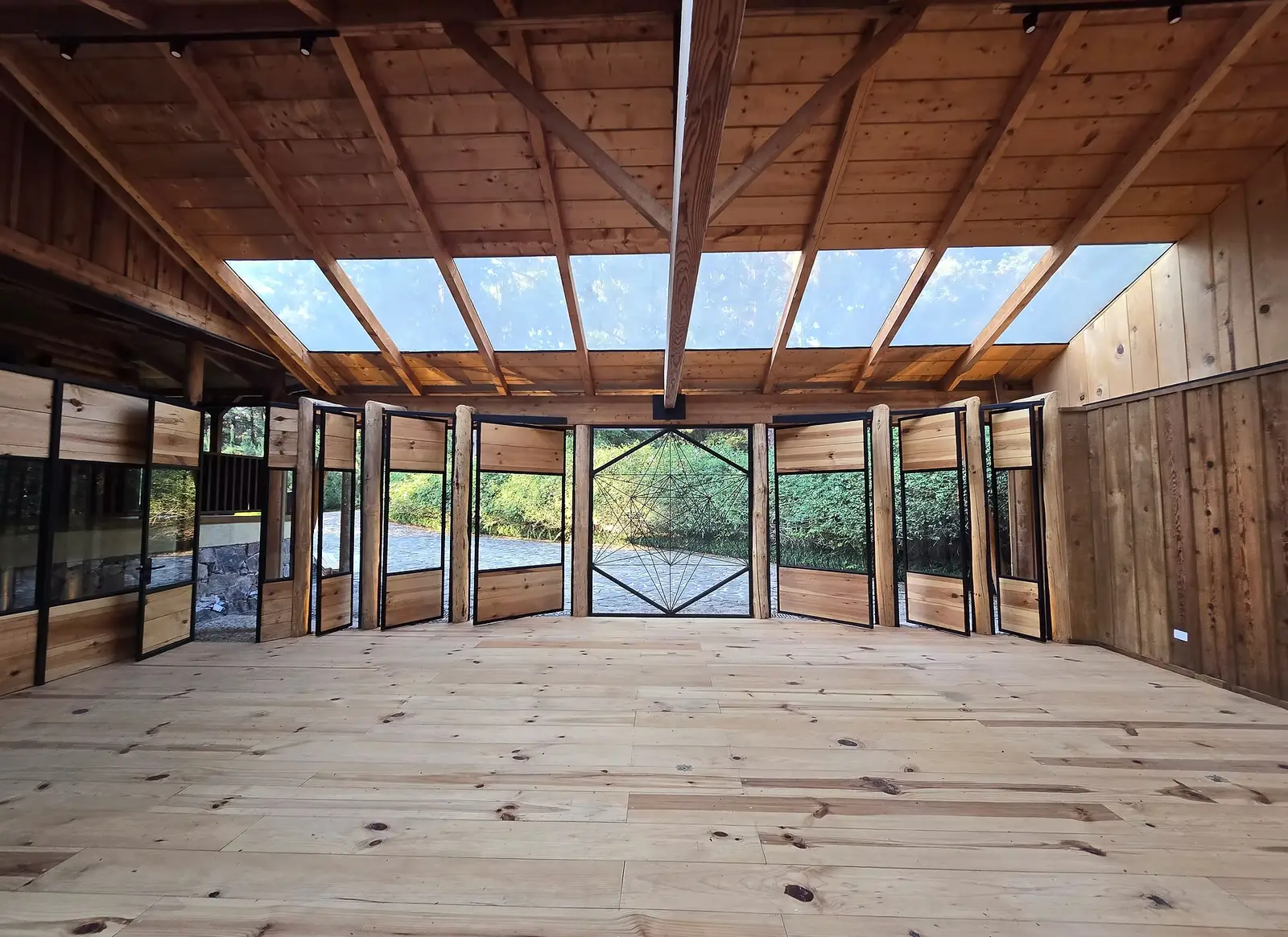 The temple studio at Hunkápi Centre, open on all sides to the pine forest